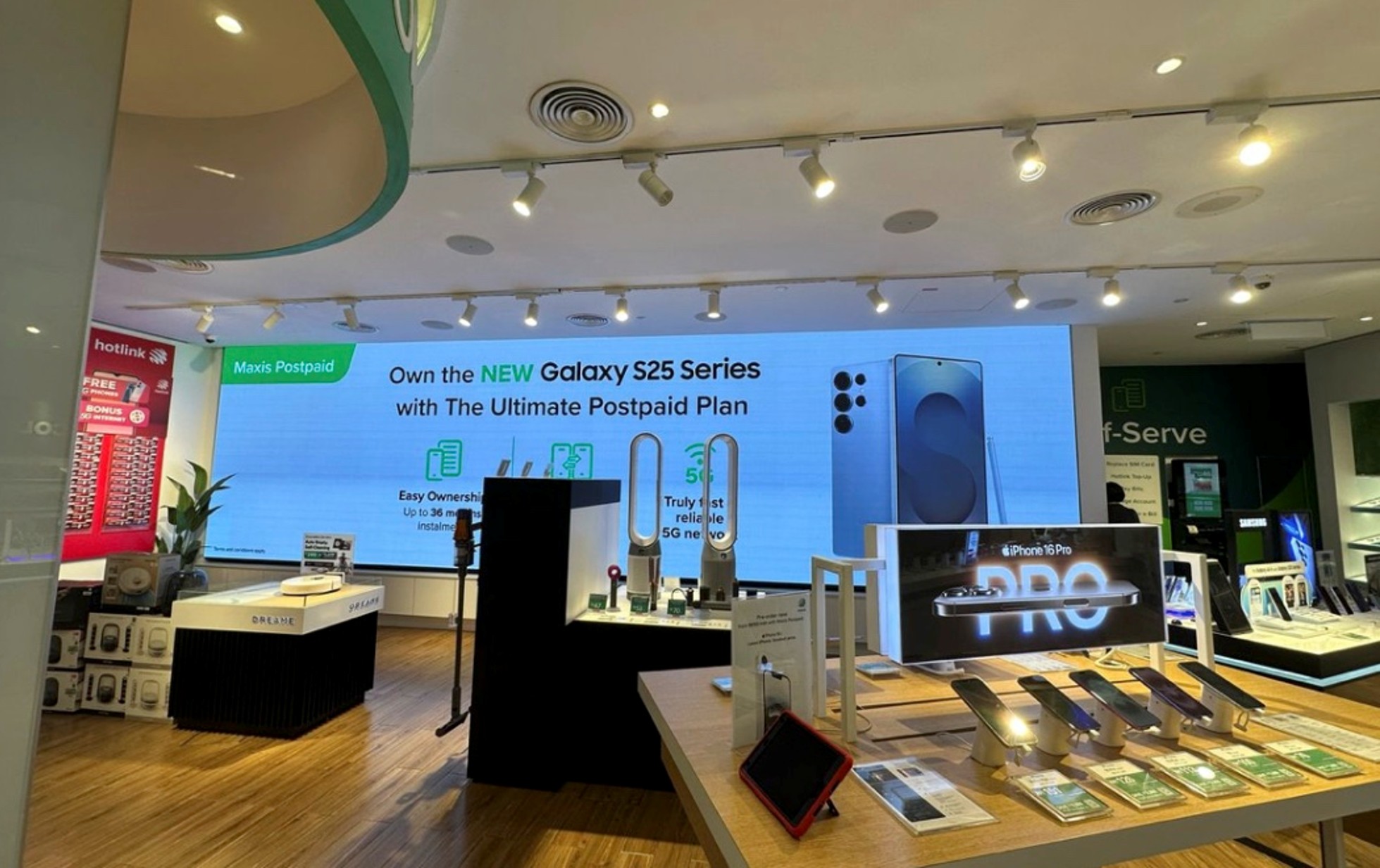 Maxis Centre storefront with digital displays