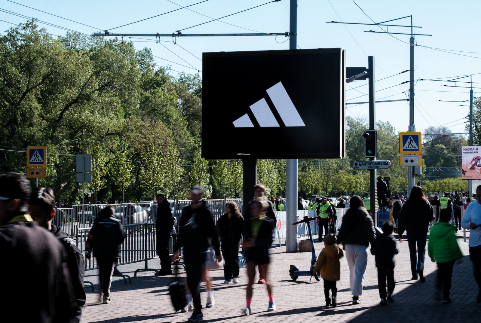 adidas programmatic DOOH screen in Almaty